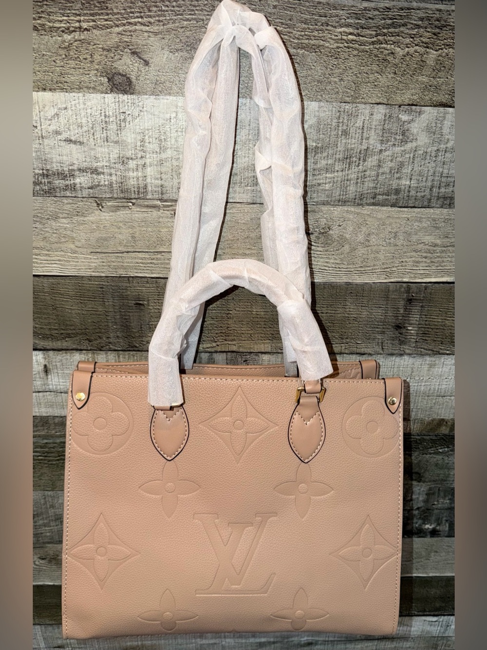 LV OnTheGo MM Embossed Tote